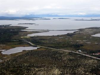 The village of Ilamna, Alaska is just a small cluster of buildings around crystal-clear Lake Iliamna, a nursery for wild salmon, which at 80 miles long is the largest U.S. freshwater lake outside the Great Lakes. (Bill Roth/Anchorage Daily News/MCT via Getty Images)
