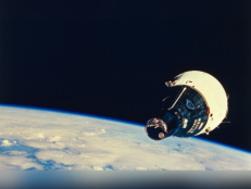 December 1965: The Gemini 7 space capsule orbits the earth during its 14-day manned mission.  